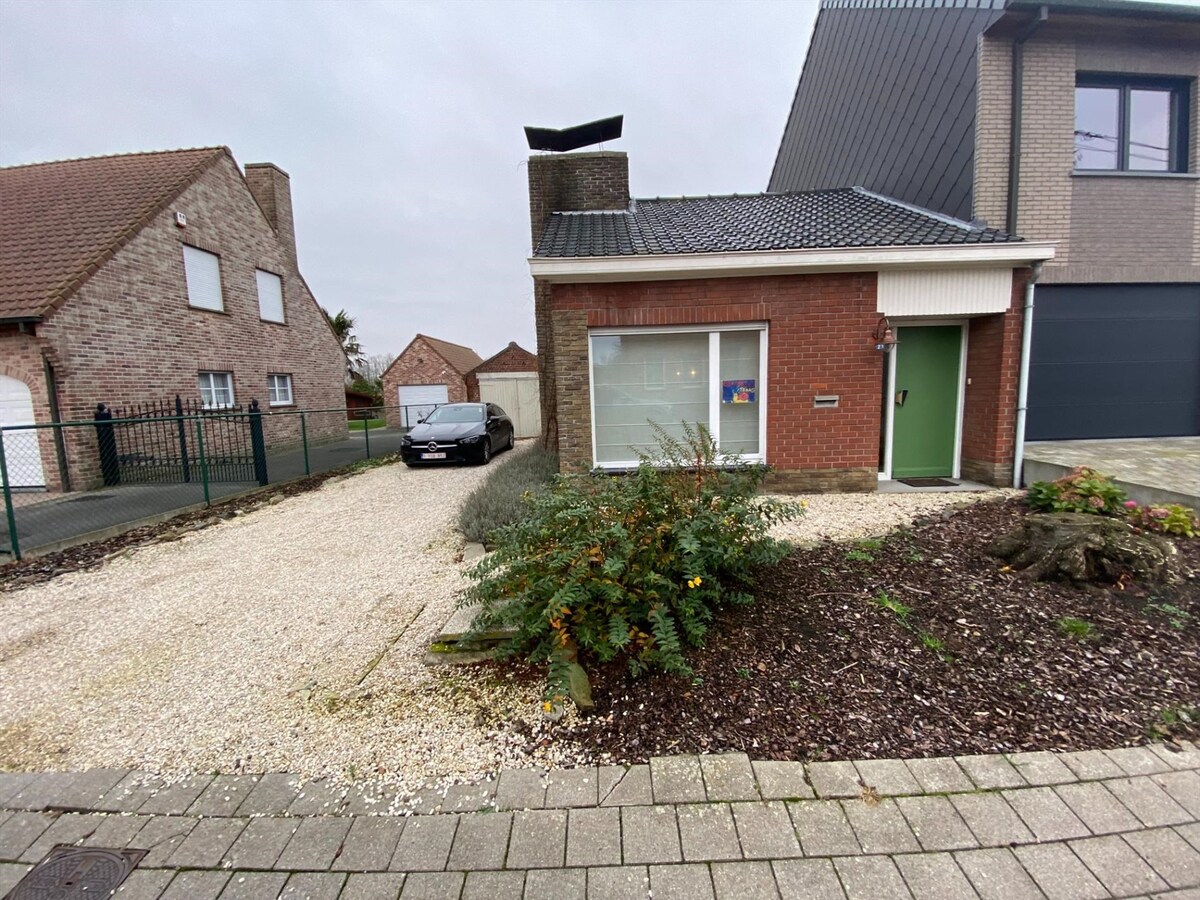 Rustig gelegen halfopen woning met zongerichte tuin 