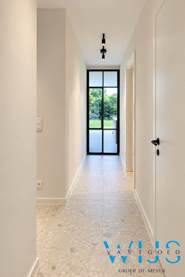 High-end gelijkvloers appartement met tuin te Lembeke ! 