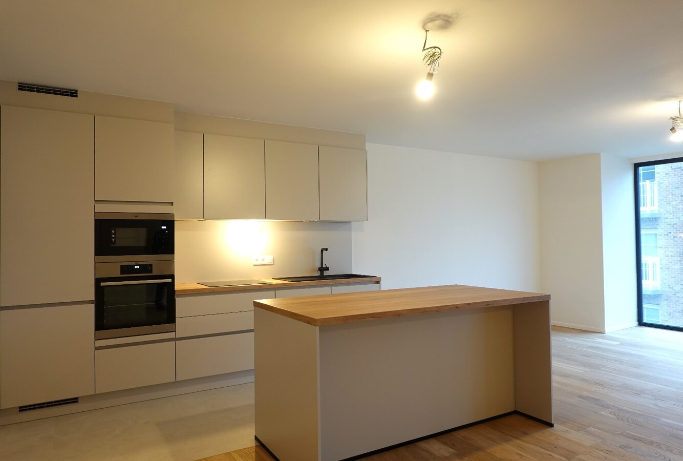 Prachtig afgewerkt nieuwbouwappartement in centrum De Haan met garagebox 