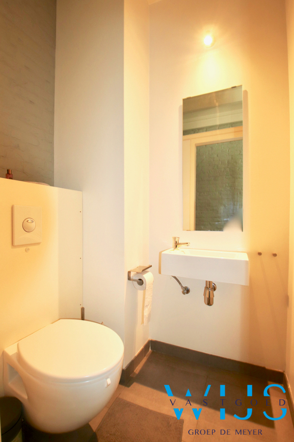 Instapklaar woonhuis met tuin te centrum WAARSCHOOT ! 