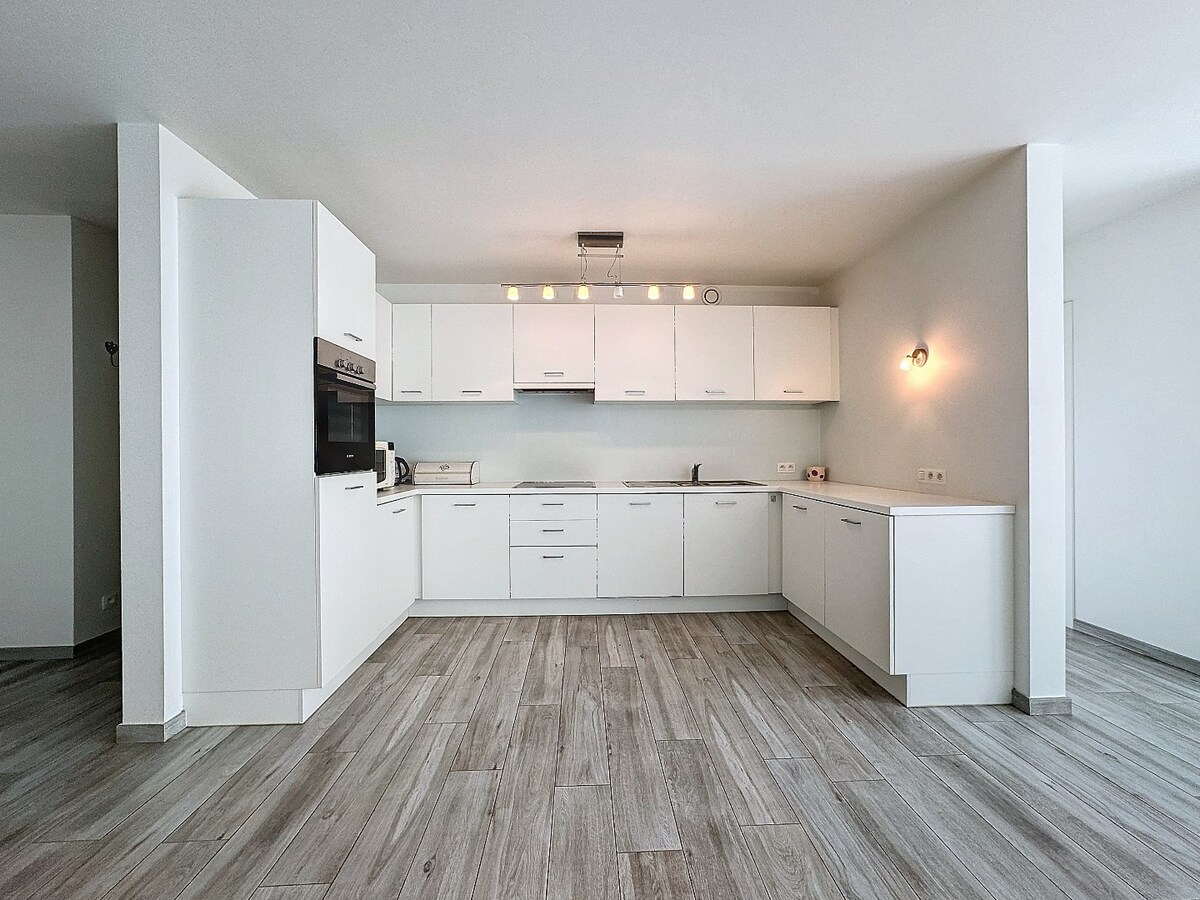 Recent (2017) gelijkvloers appartement met grote tuin te Ophasselt 