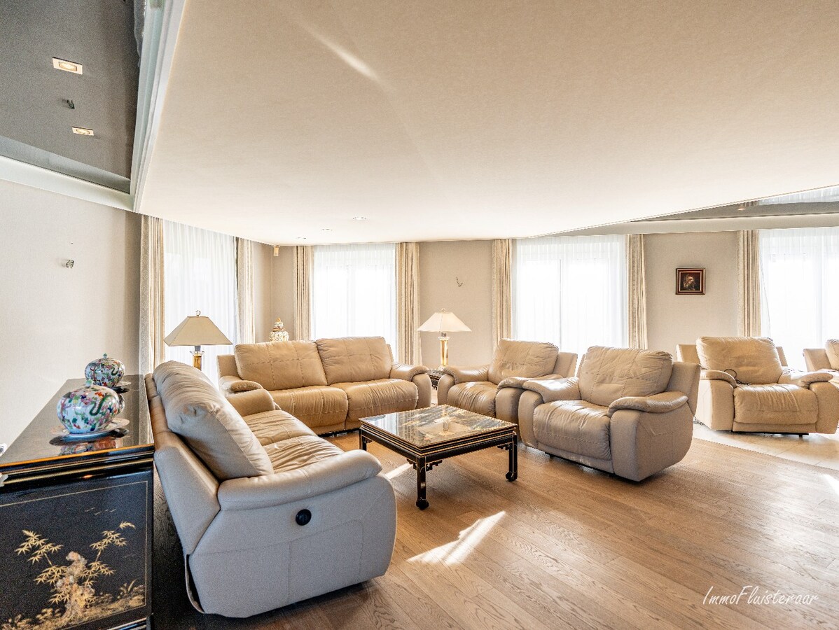 Rural villa with multifunctional outbuilding on approximately 51 acres in Bilzen 