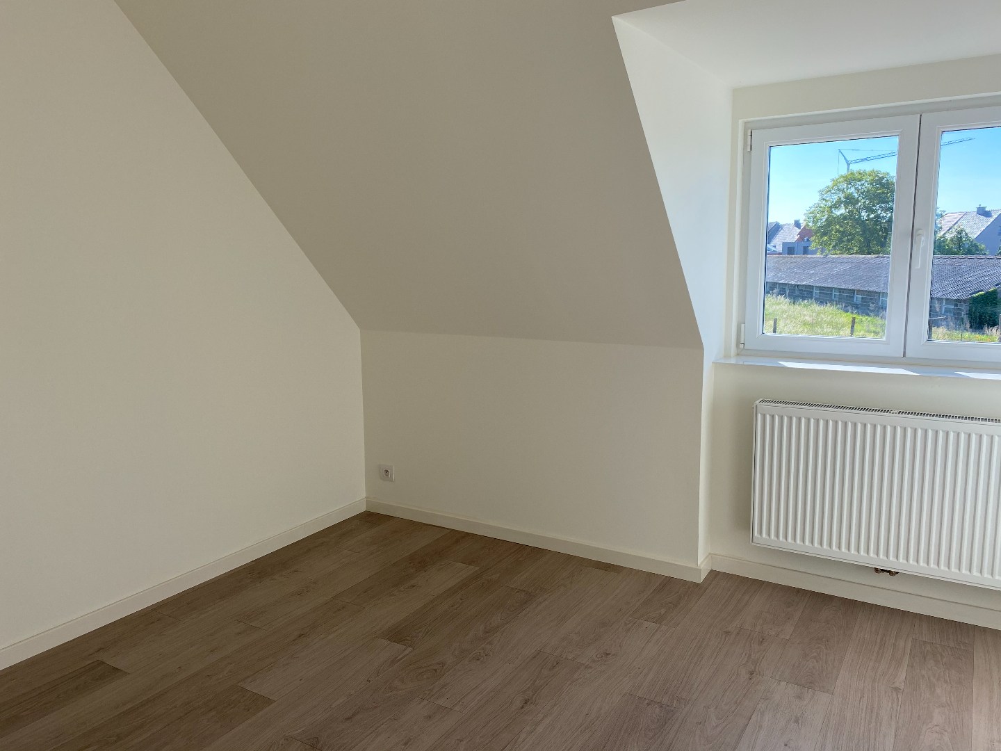 Energiezuinige halfopen woning met tuin en carport te Zulte 