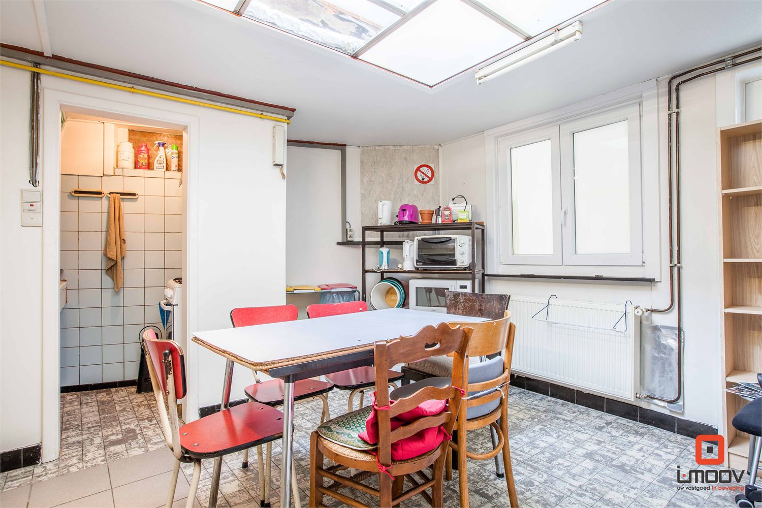 Mooie opbrengsteigendom met vijf lichtrijke studentenkamers 