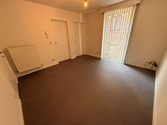 Verzorgd appartement met 1 slaapkamer, terras en lift in het centrum van Maaseik. 