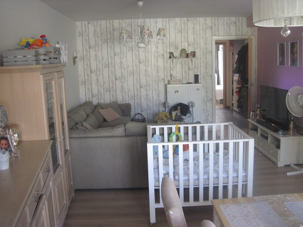 Ruim gelijkvloers appartement met terras en tuintje. Incl. afz. garage ! 