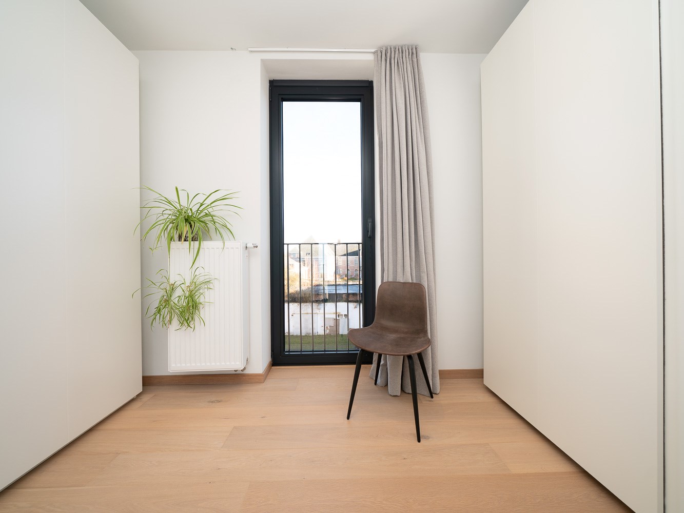 Recent 2-kamer appartement met terras, parking en kelder 