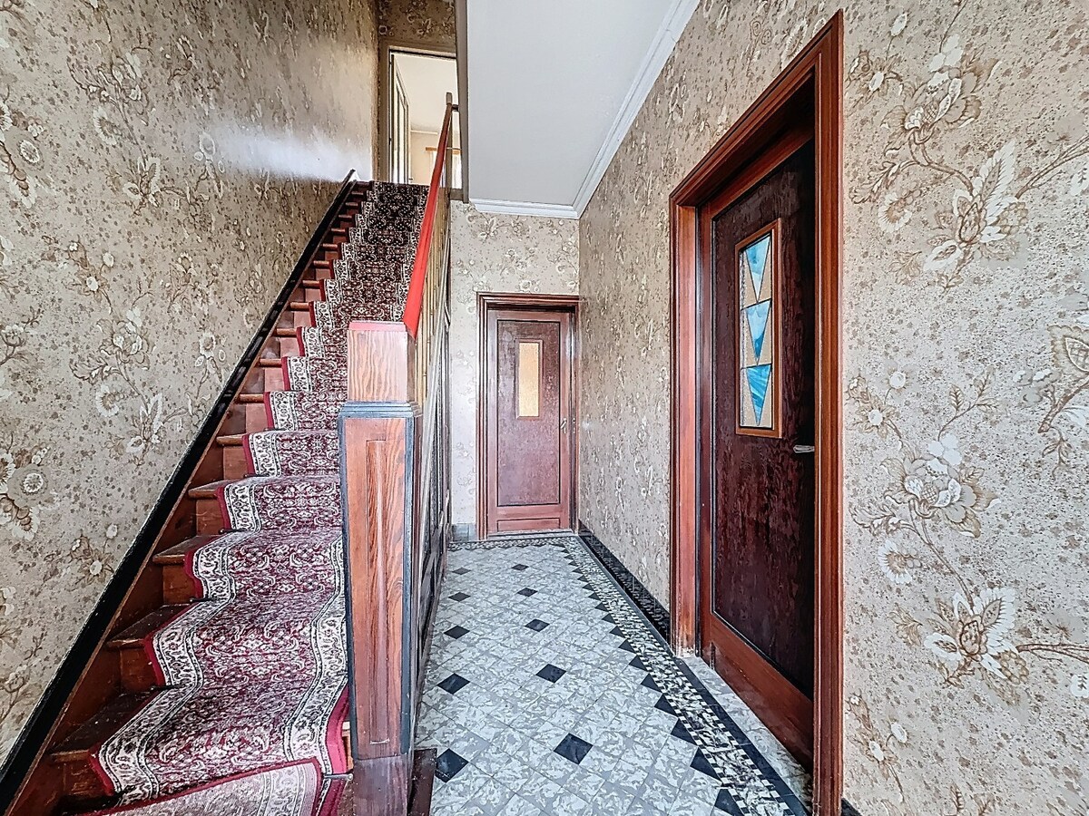 Te renoveren woonhuis met bouwgrond te Balegem/Elene 