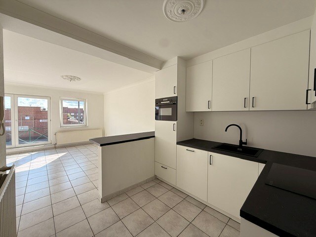 Prachtig appartement met 2 slaapkamers, terras en garage in het centrum van Dilsen 