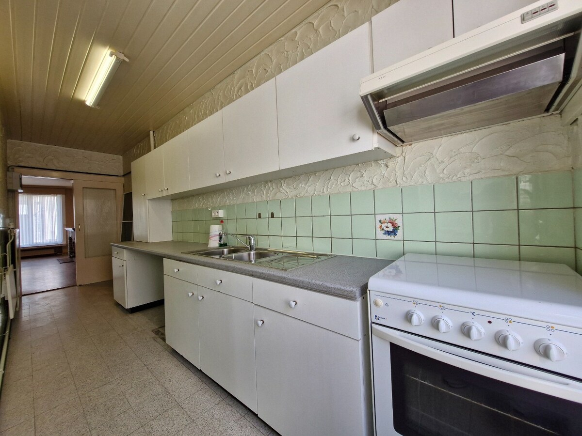 Charmant gelijkvloers appartement met stadskoer in hartje Heist 