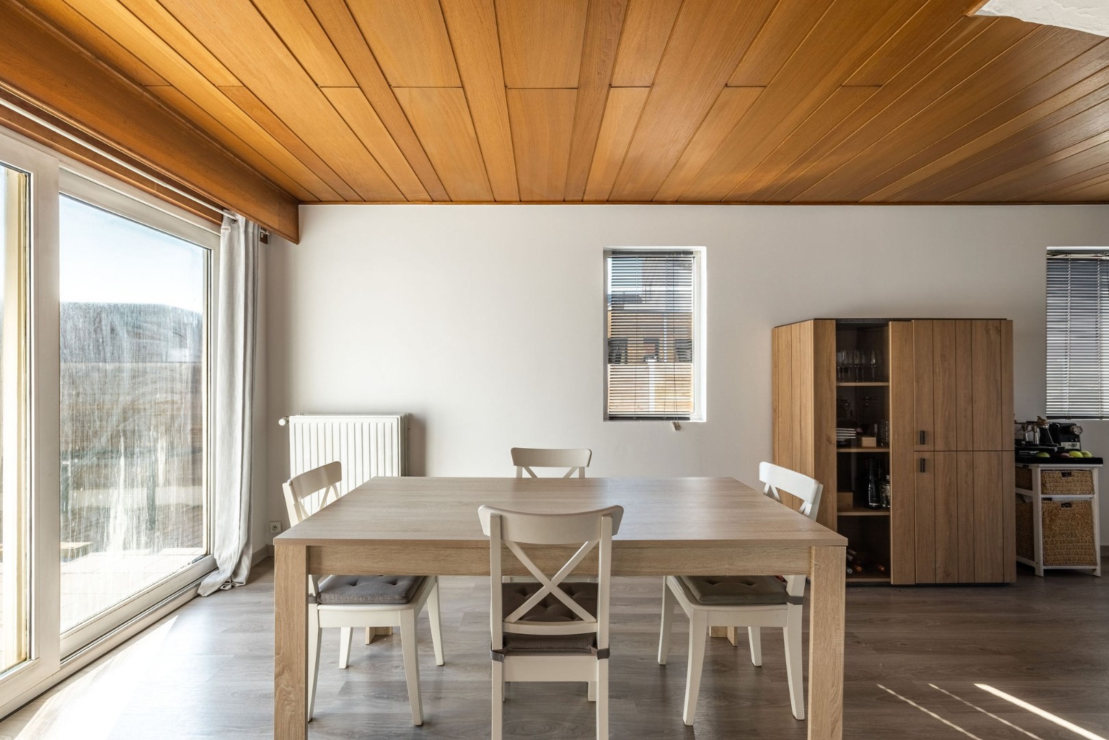 Authentieke woning met zonnige tuin, garage en bouwgrond 