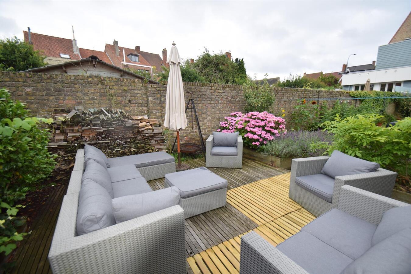 Kwalitatief gerenoveerde, ruime 4-slpk-woning met toffe stadstuin op Christus-Koning 