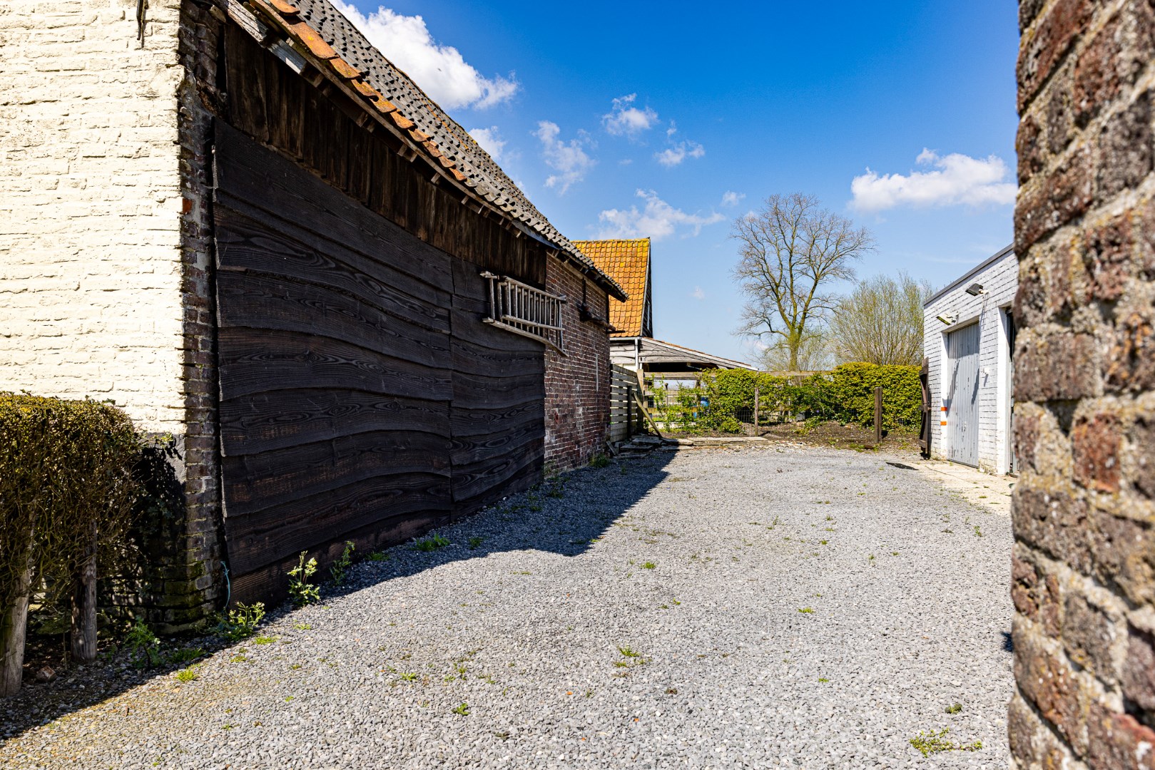 Woning met handelspand landelijk gelegen te Ursel 