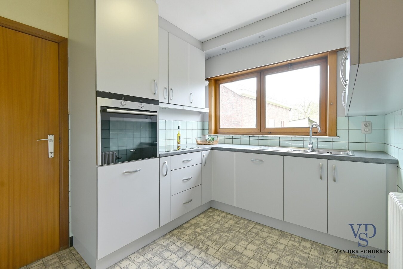 Degelijke eigendom met mogelijkheden 