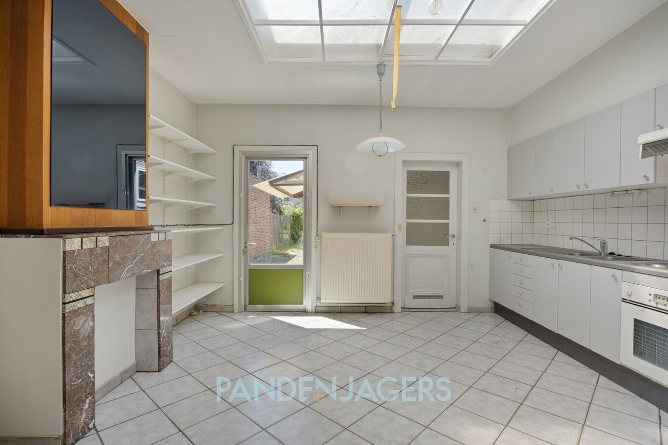Rijwoning met diepe tuin en extra ingang voor de tuin te Duffel 