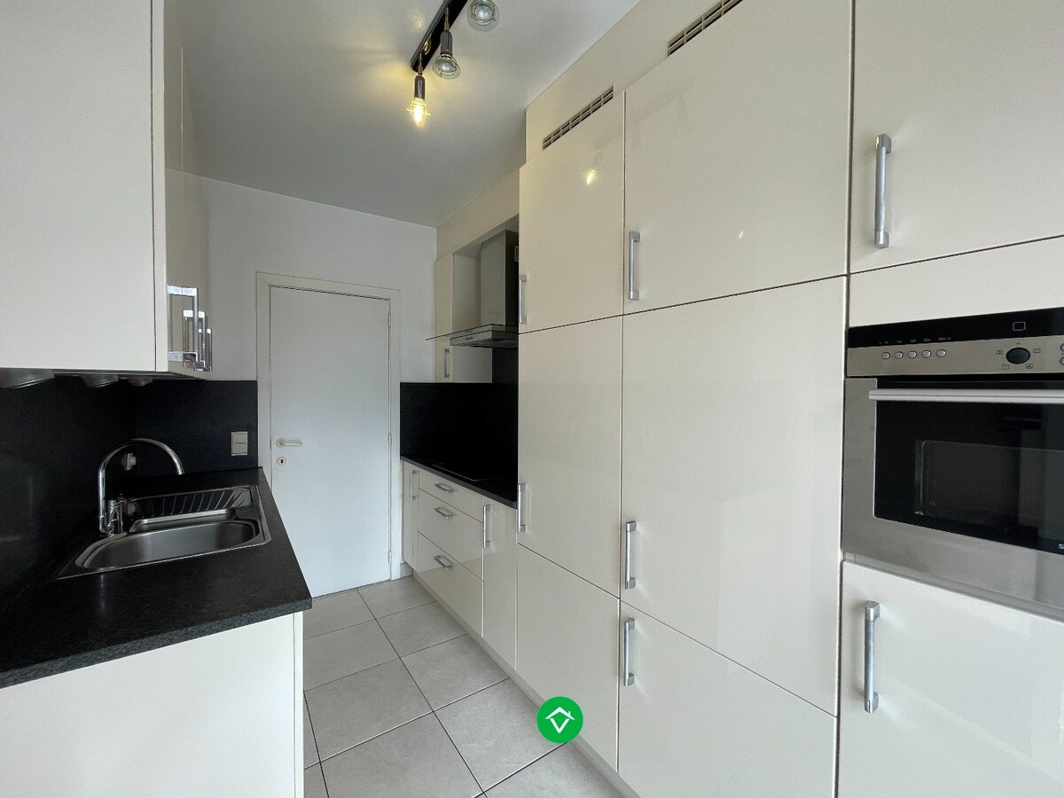 Gezellige rijwoning met 3 slaapkamers, terrastuin en garage te Kachtem 