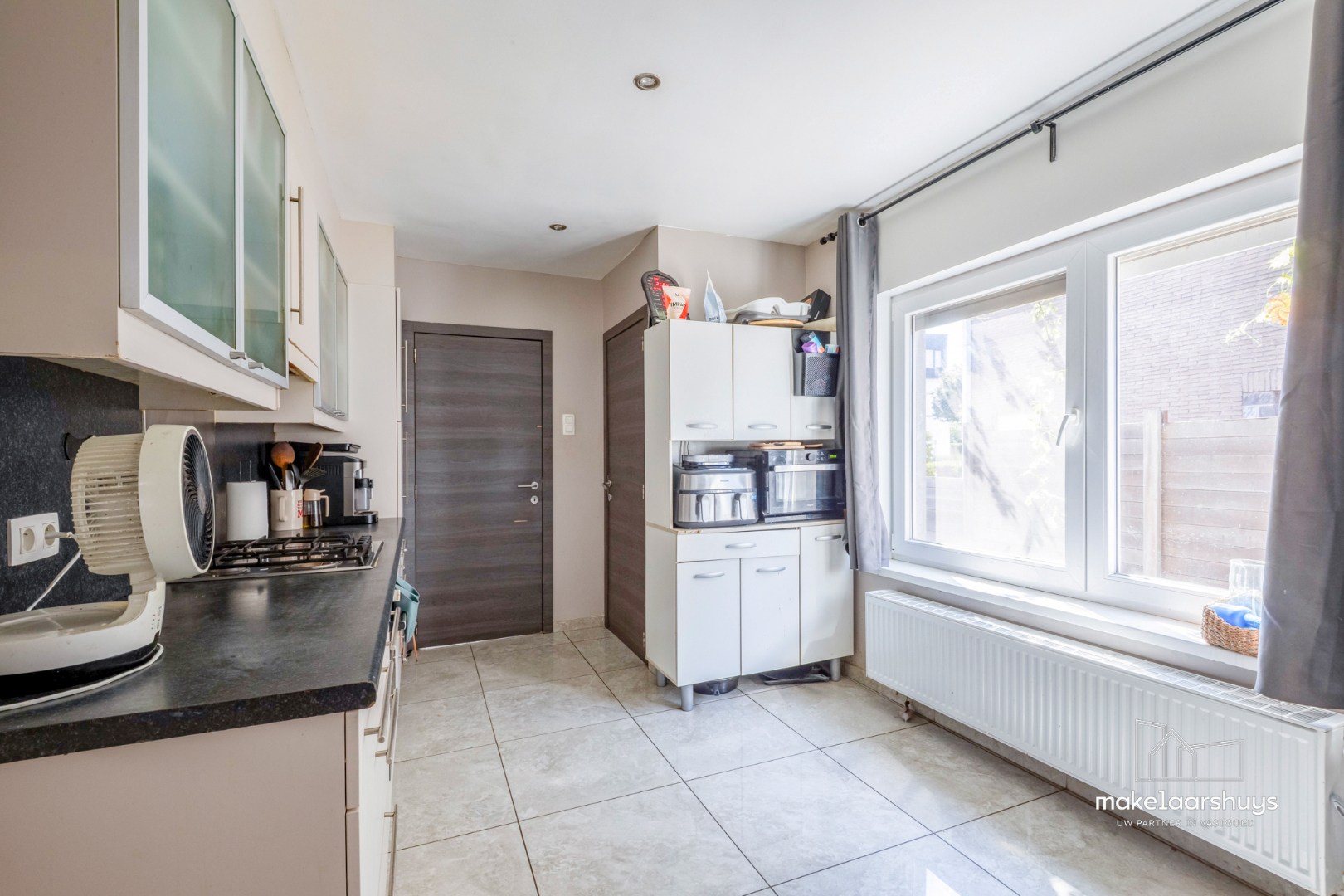 Ruime HOB met 3 slpks in een rustige straat te Wondelgem 