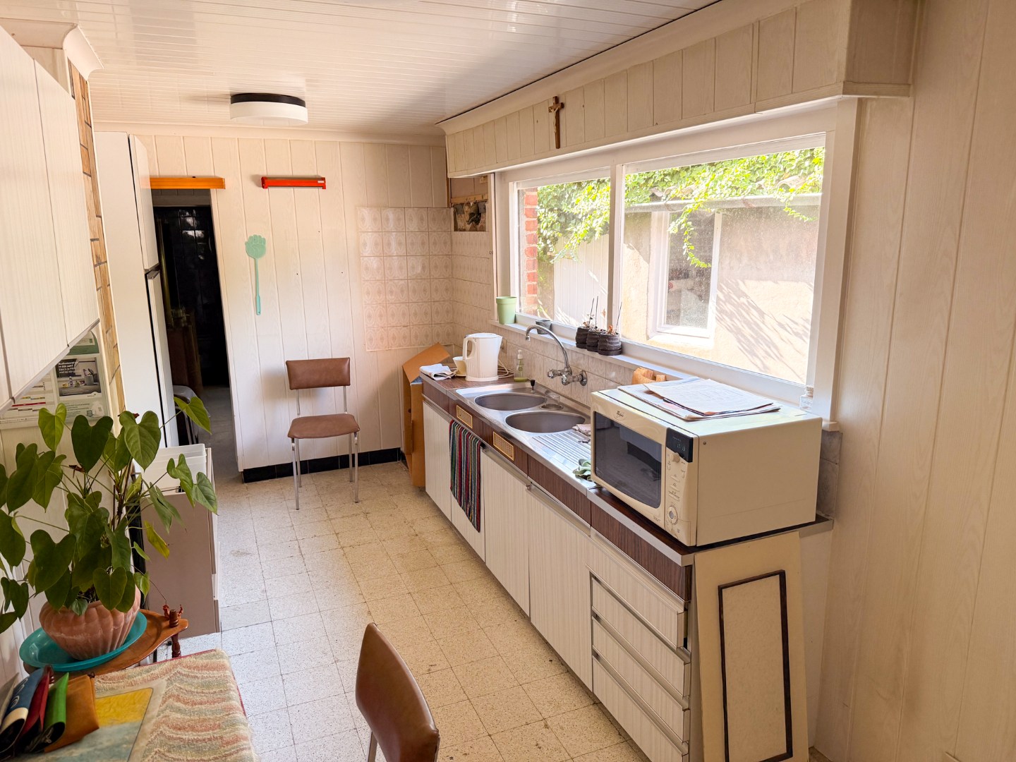 Te renoveren half open bebouwing nabij centrum Olsene 