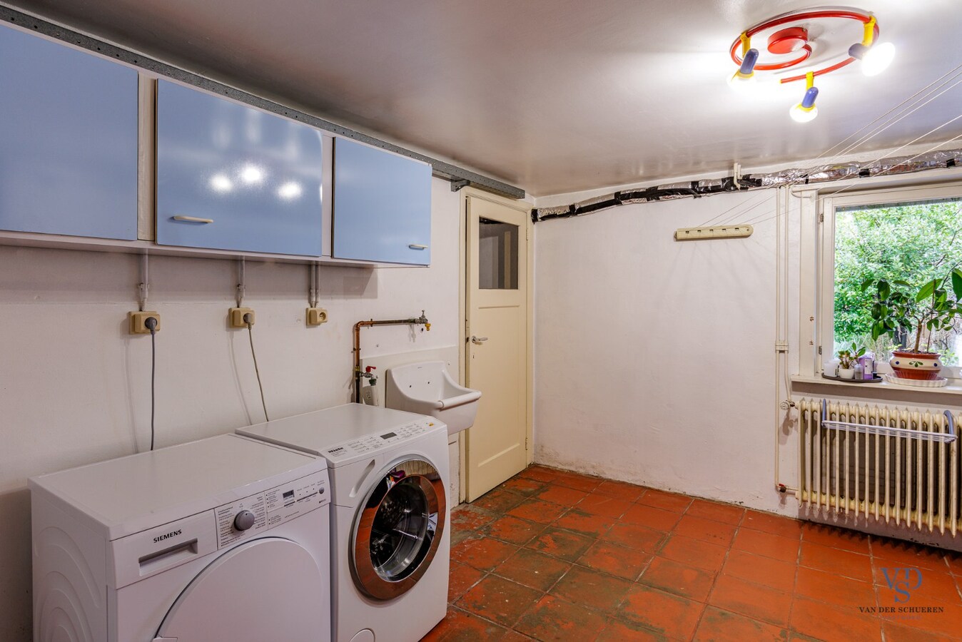 Tijdloos wonen in Gent met royale tuin 