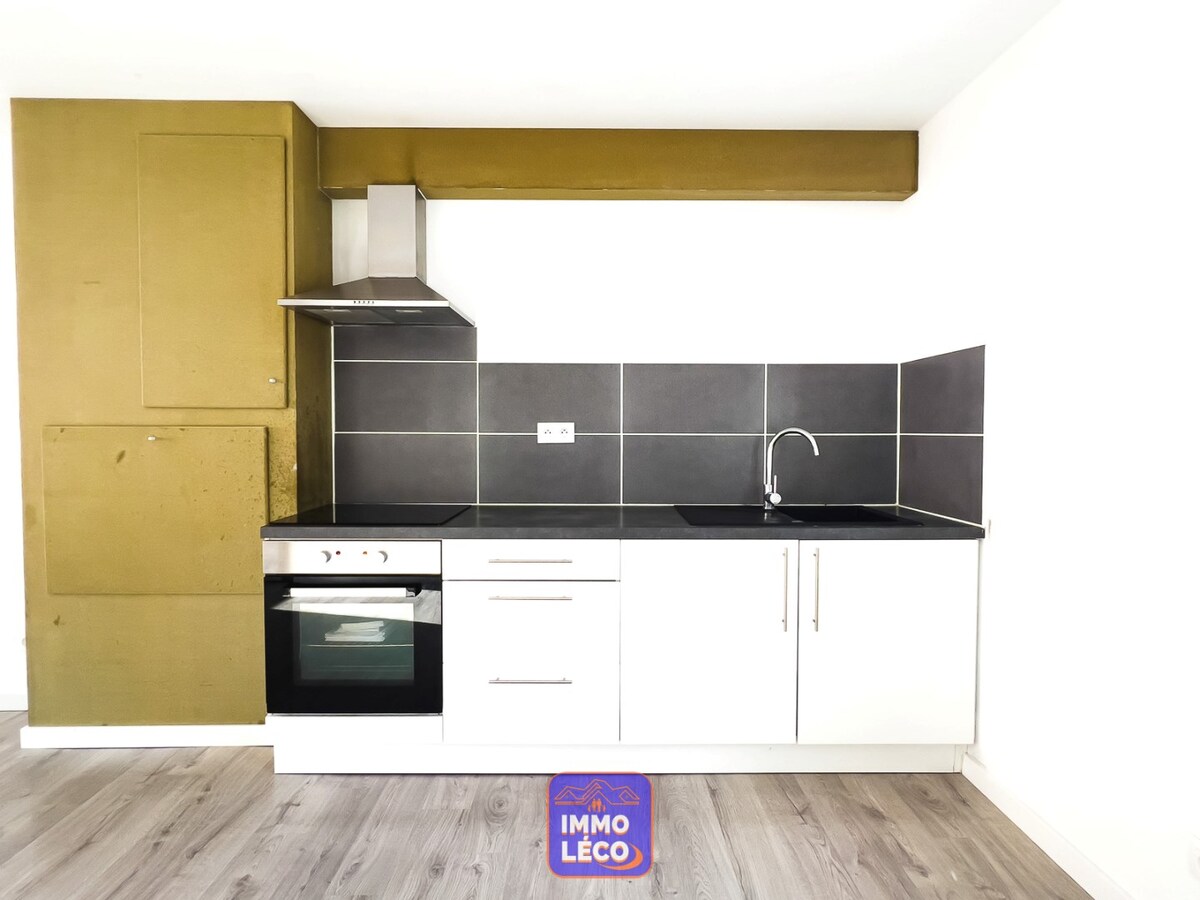 Appartement « DUPLEX » avec garage, idéalement situé 