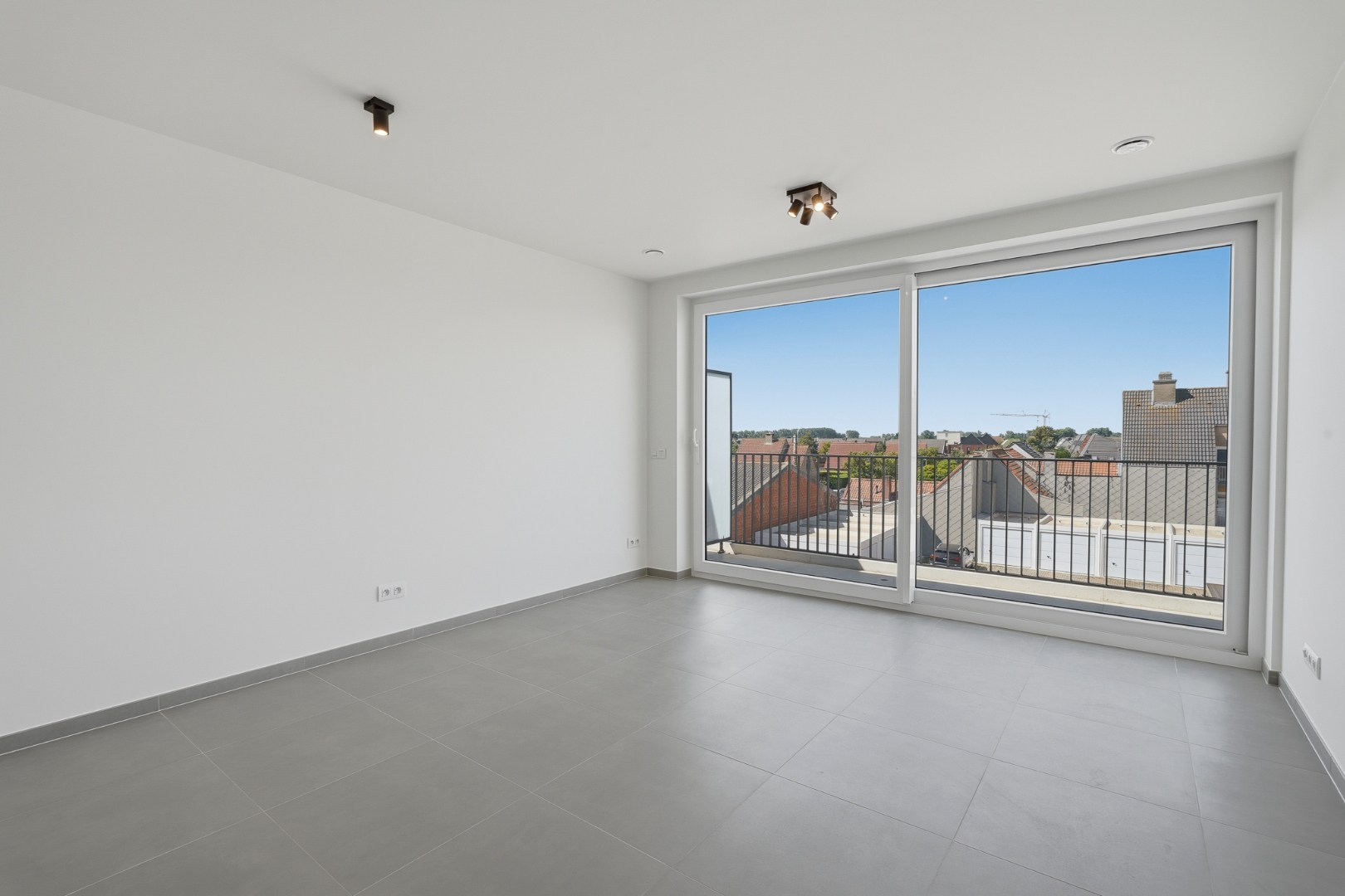 Nieuwbouwappartement met 1 slaapkamer en bovengrondse staanplaats te huur in Oudenburg! 