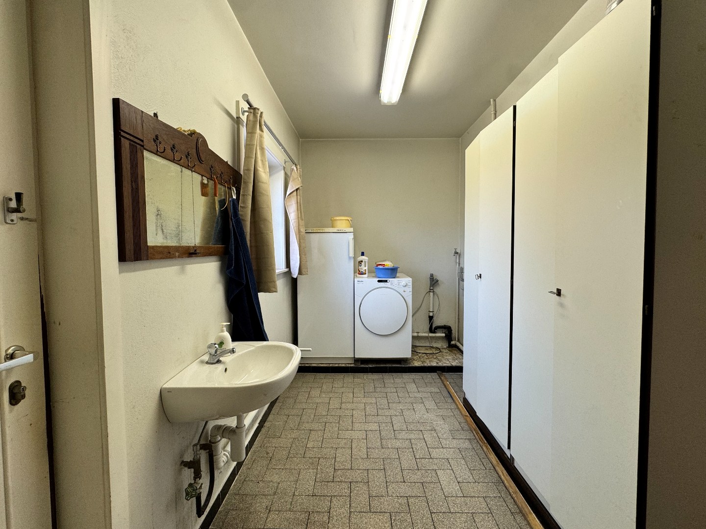 Woning op groot perceel met 3 slaapkamers en garage te Deinze 