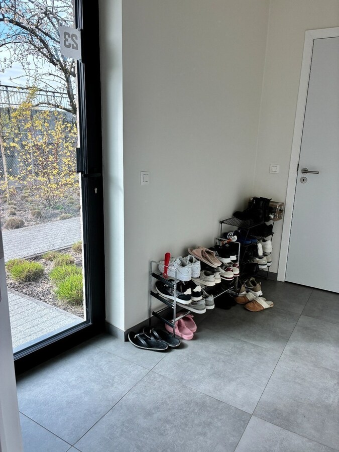 Nieuwbouwwoning op 50m van tramhalte - met terras en tuin ! 
