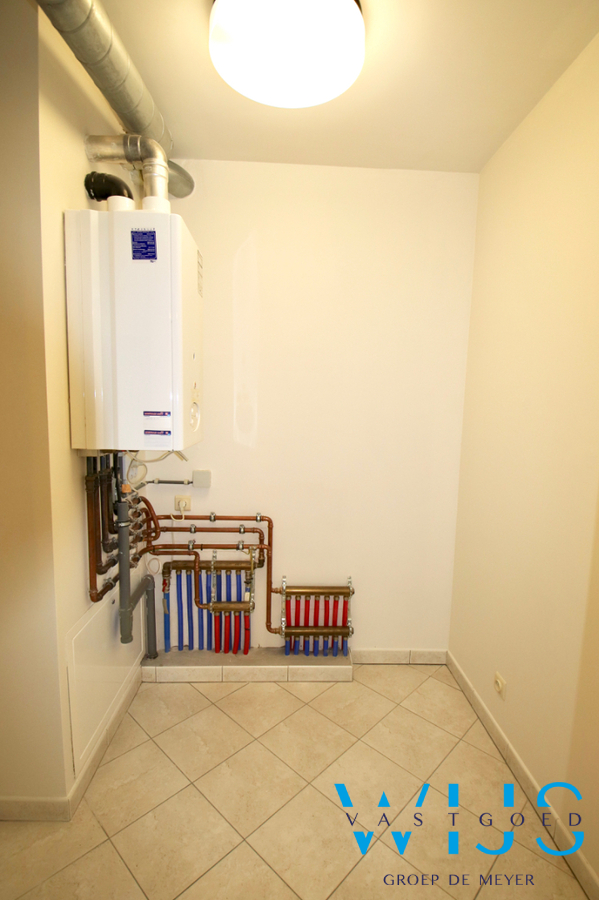 Instapklaar 3 slaapkamerappartement met garage in hartje Assenede ! 