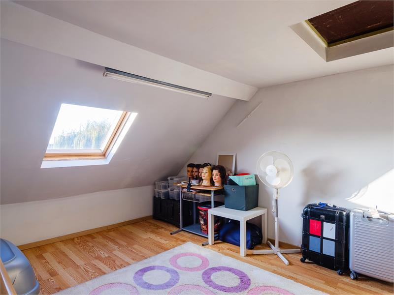 Rijwoning met 4 slaapkamers en ruim terras 