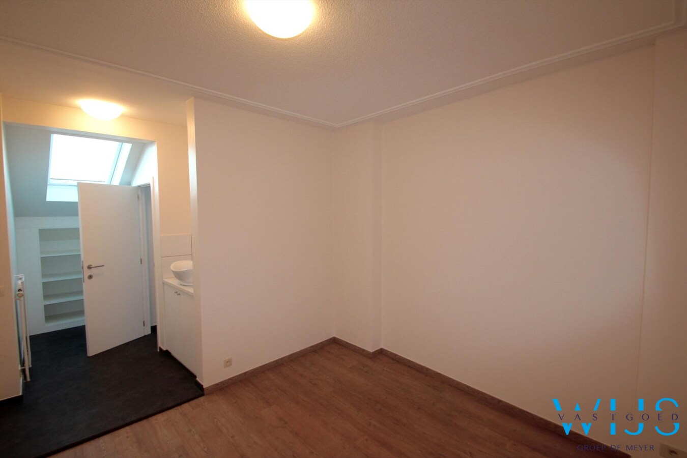 Uniek dakappartement te CENTRUM EVERGEM ! 