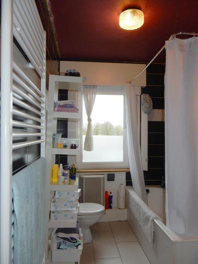 Woning met zonnige tuin en garage 