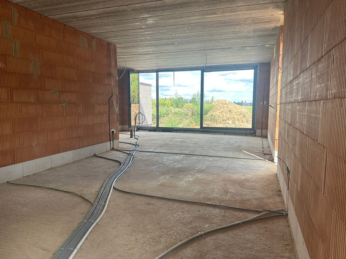 Mijmeren over de velden - in een luxueuze half open nieuwbouwwoning in Rotem 