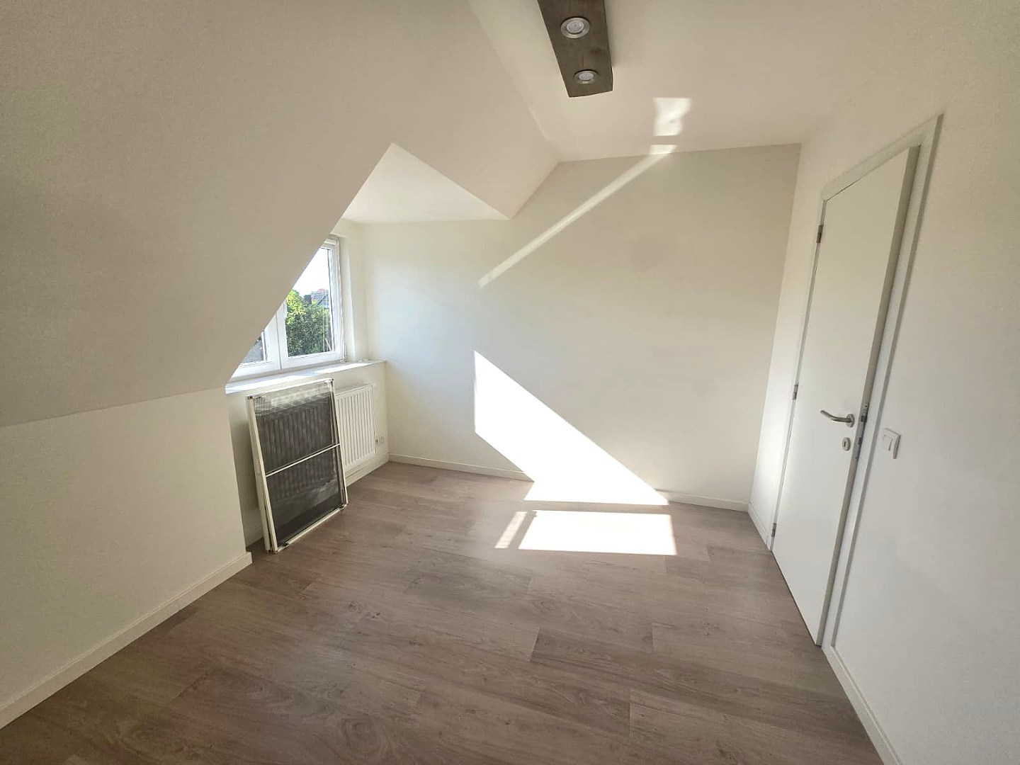 Energiezuinige halfopen woning met tuin en carport te Zulte 