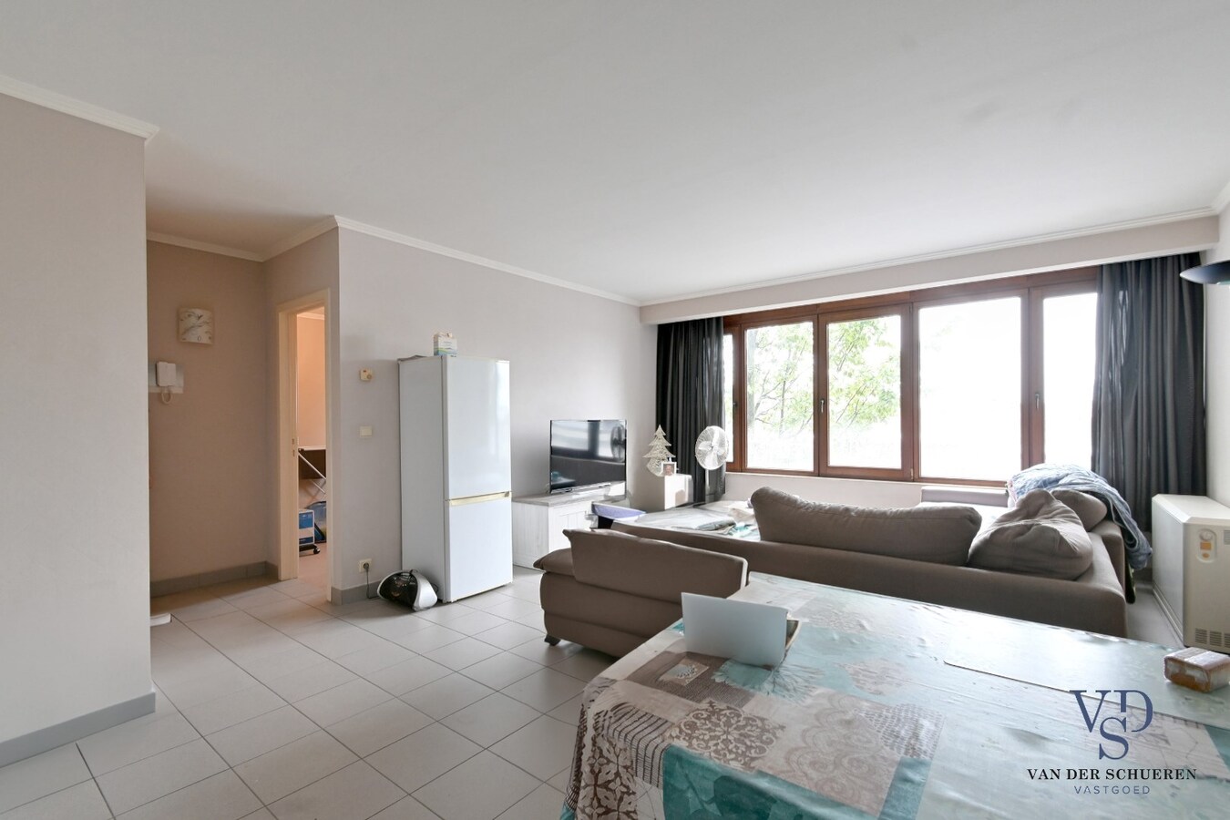 Degelijk investeringsappartement met garage. 