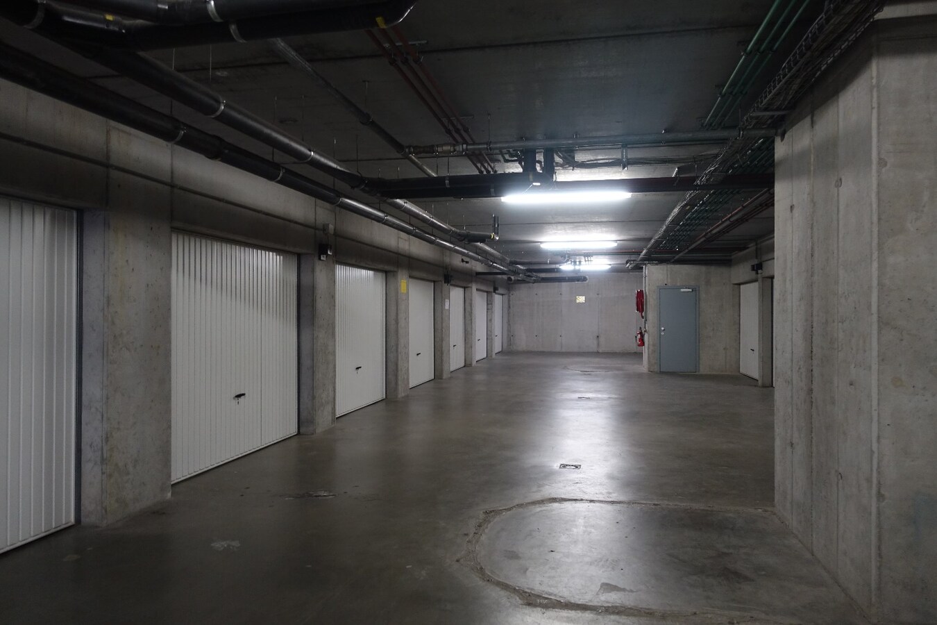 Lichtrijk duplex-appartement met garage in het centrum 