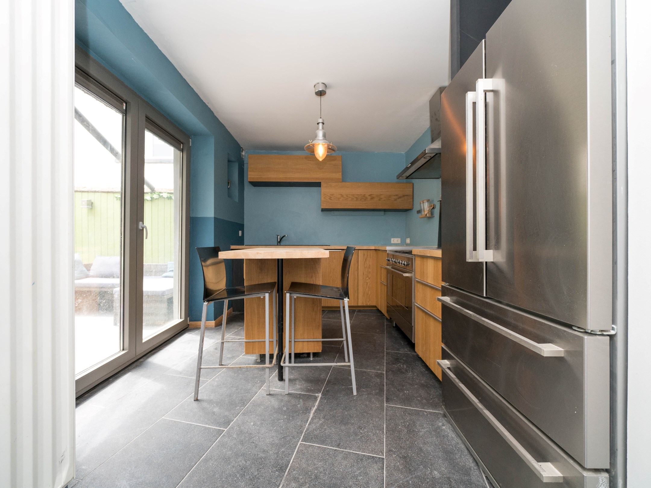 Gerenoveerde woning met 4 kamers, garage en stadstuintje 