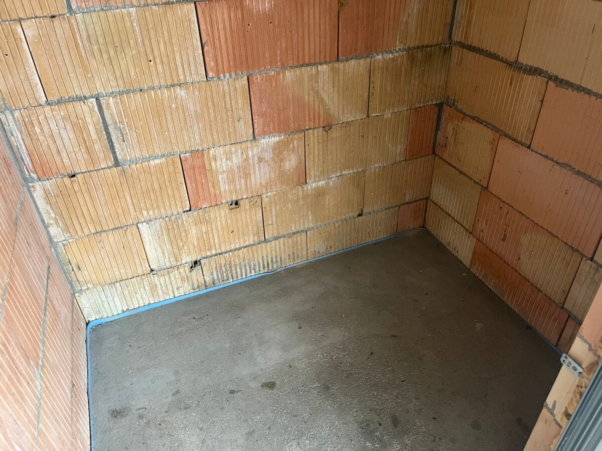 2 slpk-appartement nabij allerhande voorzieningen. 