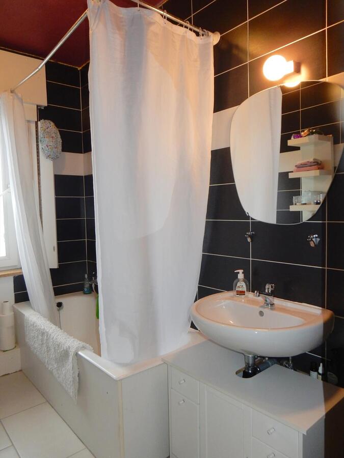 Woning met zonnige tuin en garage 