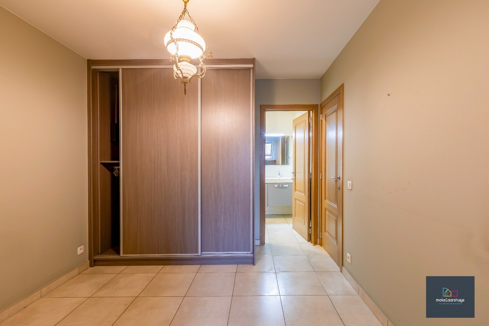 VERKOCHT Gunstig gelegen en energiezuinig appartement met zonneterras en garagebox 