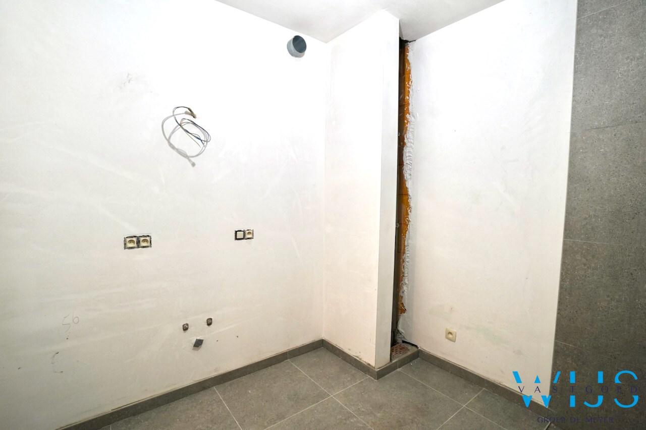 Nieuwbouw gelijkvloers appartement in hartje Ertvelde ! 