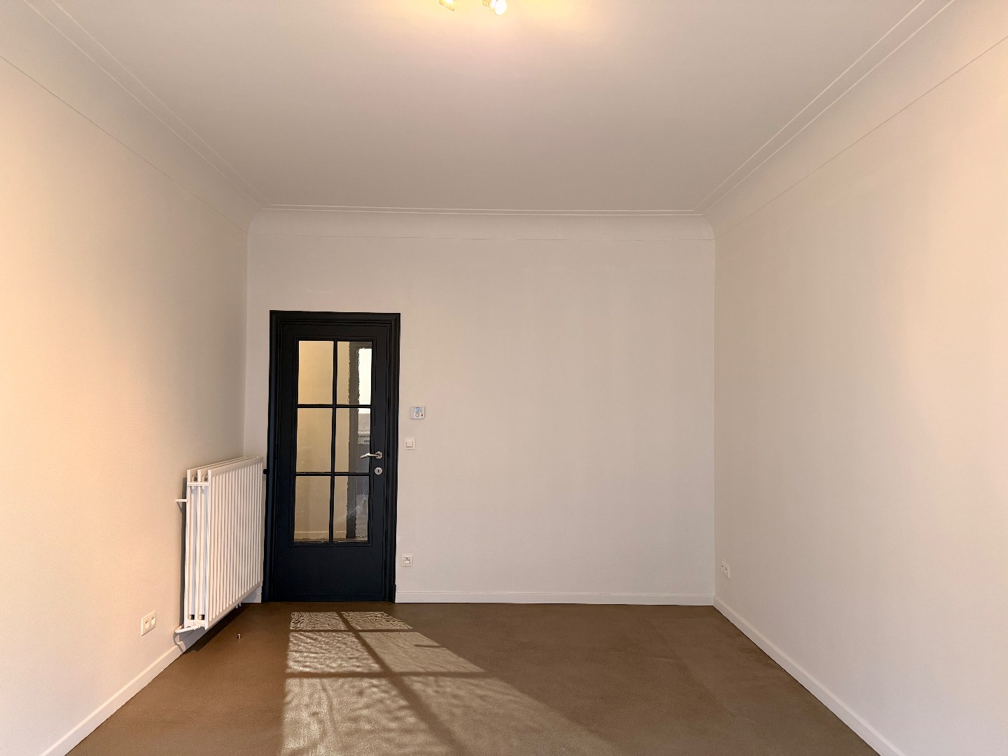 Verzorgd gelijkvloers appartement met tuin 