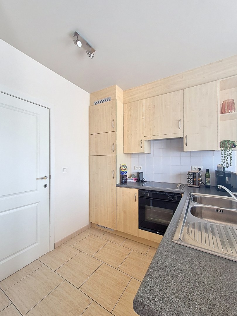 Gelijkvloers appartement met 1 slpk en garage 