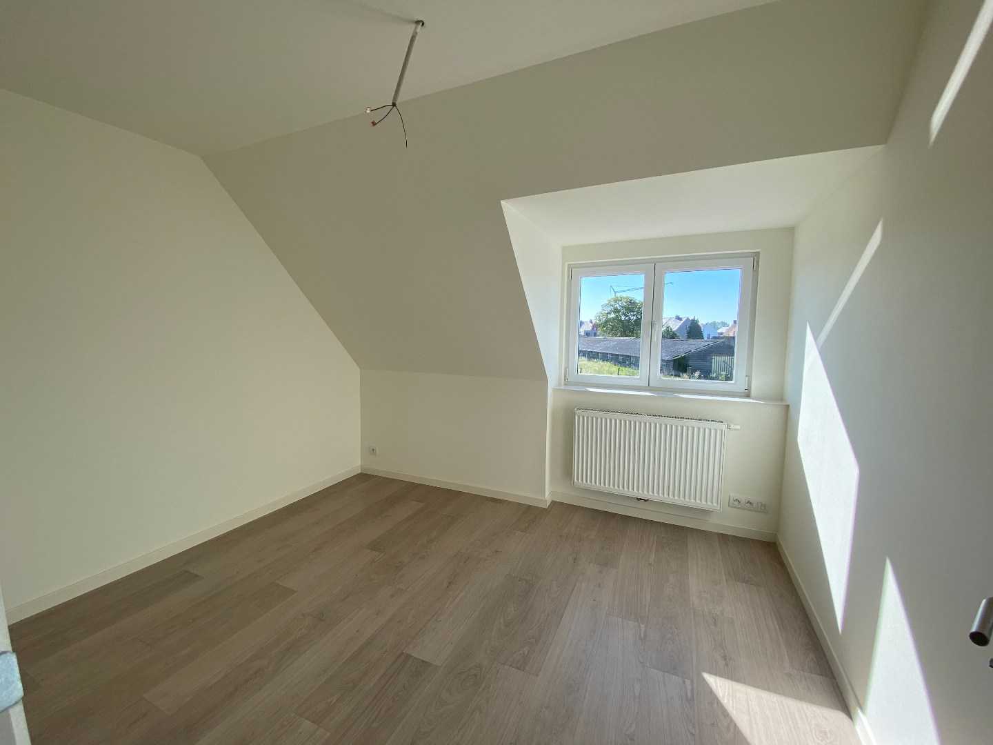 Energiezuinige halfopen woning met tuin en carport te Zulte 