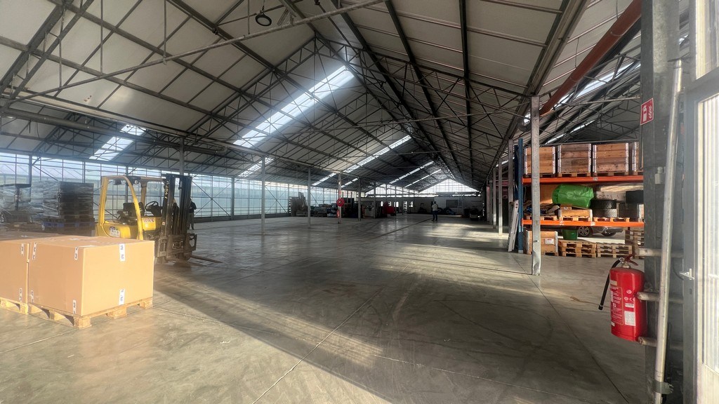 Bedrijfsgebouw te huur op zichtlocatie langs Brusselsesteenweg in Merelbeke-Melle