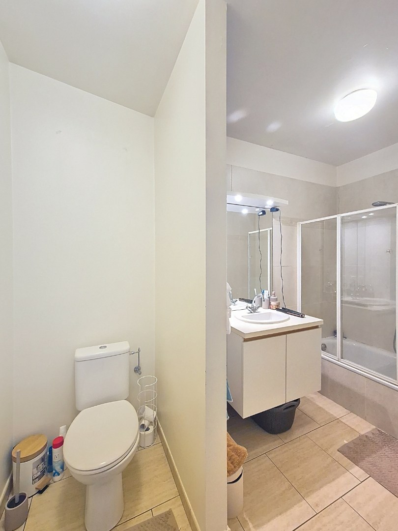 Gelijkvloers appartement met 1 slpk en garage 