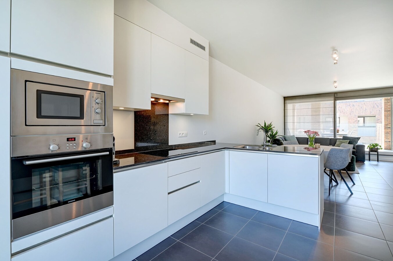 Centraal gelegen appartement met mooi terras en ondergrondse staanplaats 