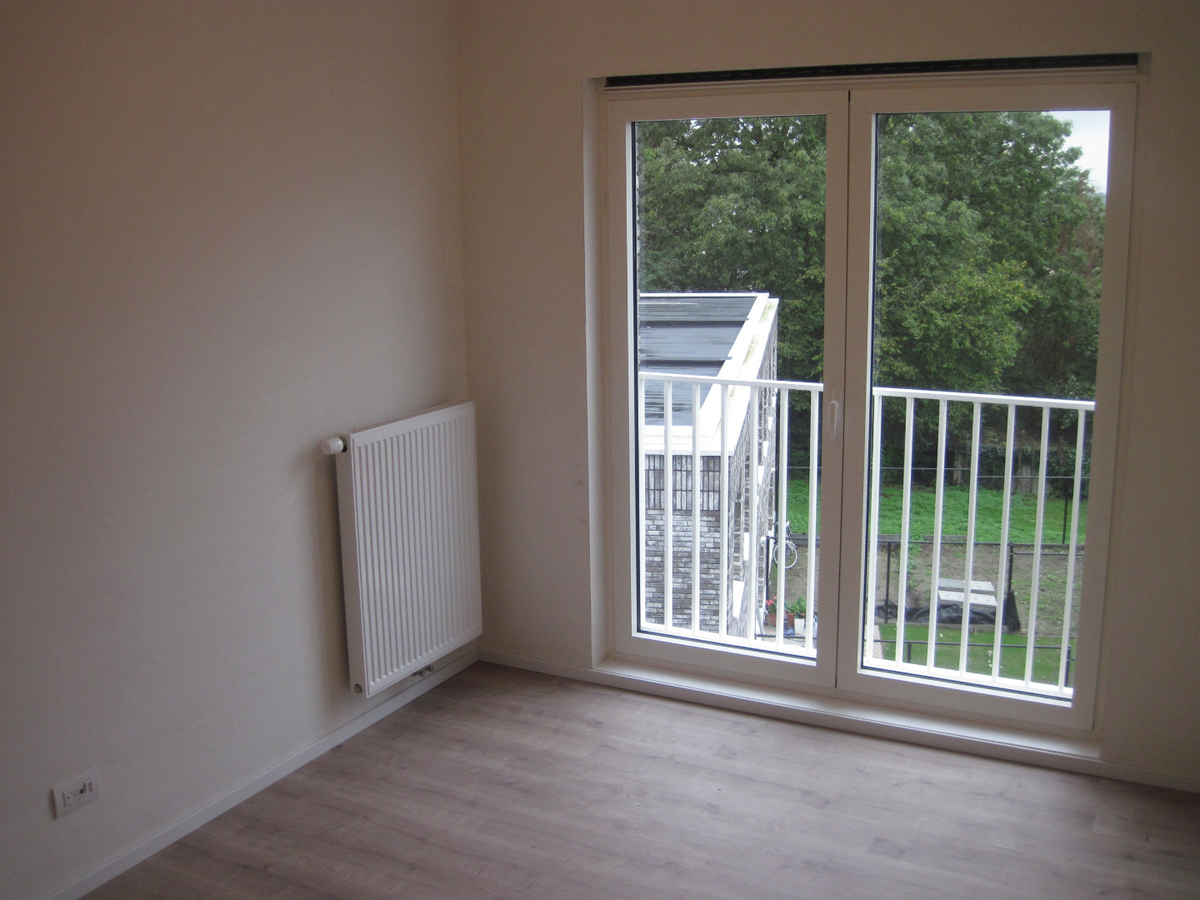 Groen wonen in de Weverij.    2-slp-appartement met een autostaanplaats. 