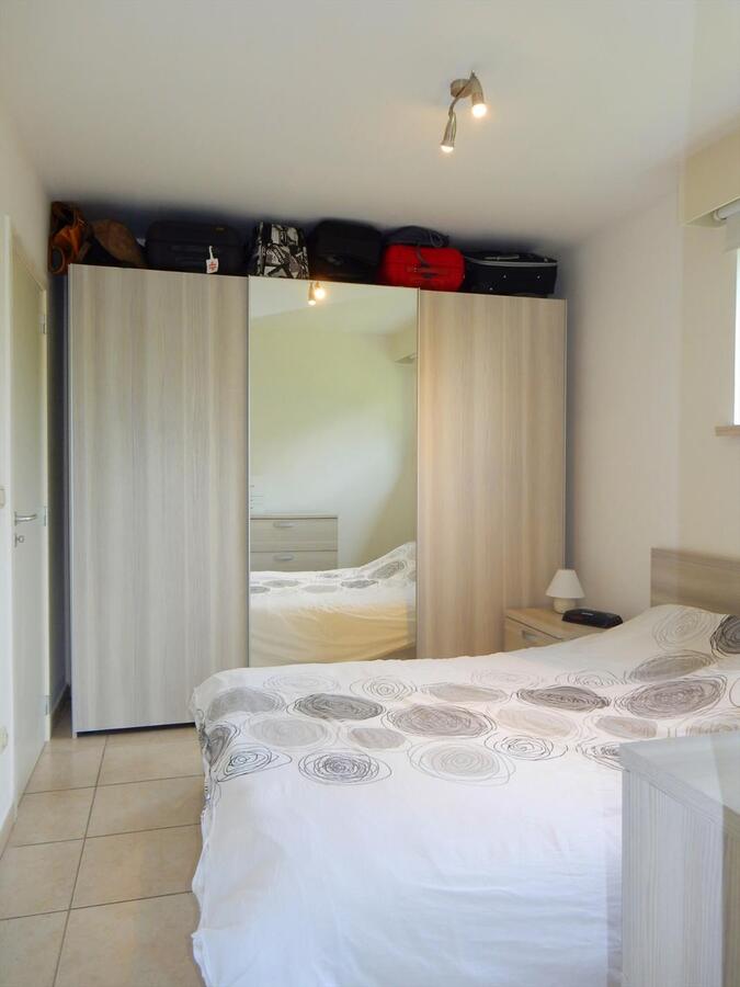 Gezellig gelijkvloersappartement met zonnige tuin en garage 