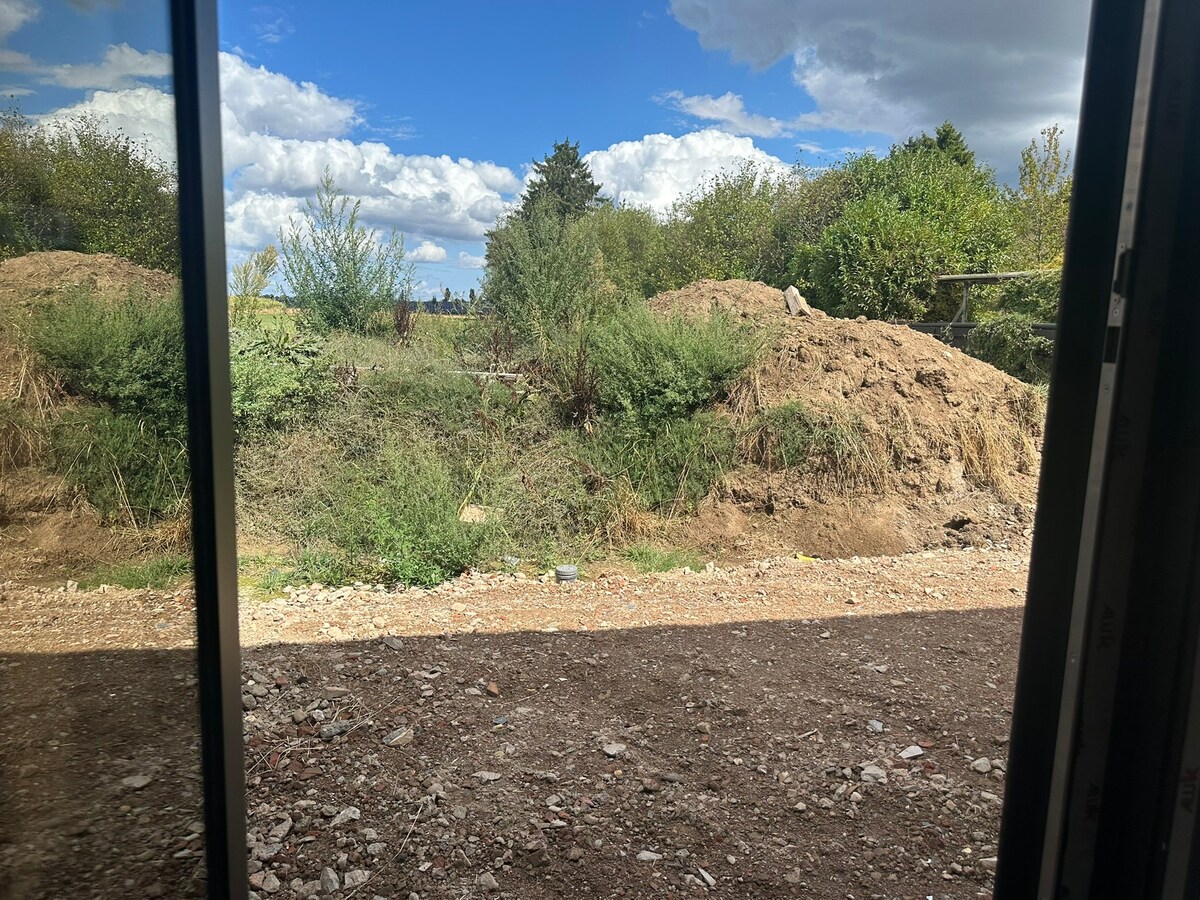 Mijmeren over de velden - in een luxueuze half open nieuwbouwwoning in Rotem 