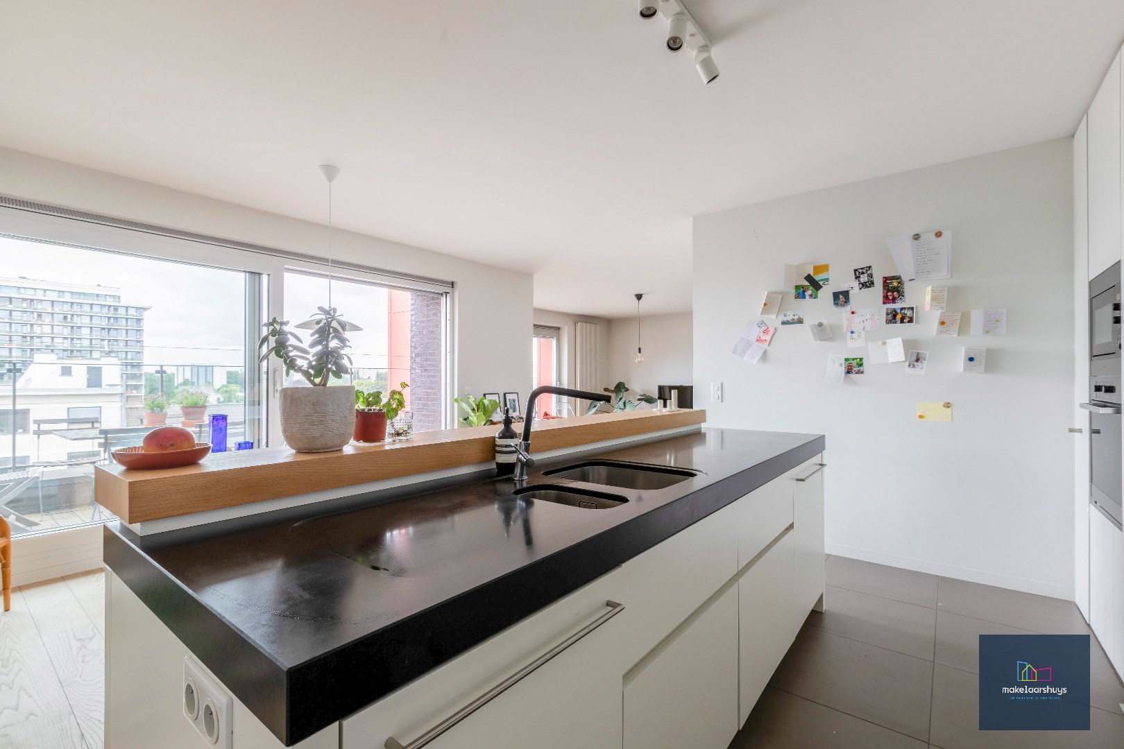 Schitterend dakapp. met 2-slp. terras en garage 